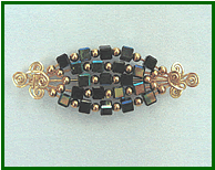 Pin with Cubic Beads - Volume Nine